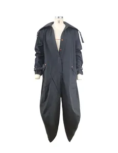 Front view of a black oversized lapel jumpsuit on a mannequin showing the unique cut.