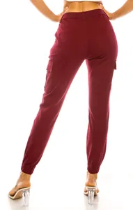 Detail back view of women's maroon cargo pants featuring multi-pockets and elastic waist.