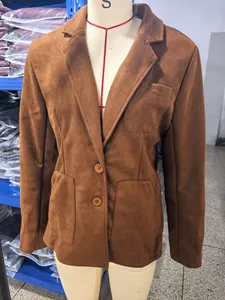 Close-up of brown suede jacket for women featuring notch lapel and front buttons
