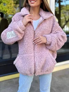 Comfortable pink sherpa zip-up jacket for women with a stylish sleeve patch detail