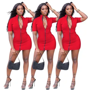 Macro view of sexy red bodycon mini dress with front zipper detail and deep V-neck