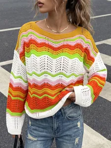 Detailed view of colorful rainbow striped hollow-out knit sweater with crochet texture