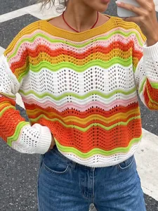 Detailed macro view of vibrant rainbow wave-striped hollow-out crochet knit sweater