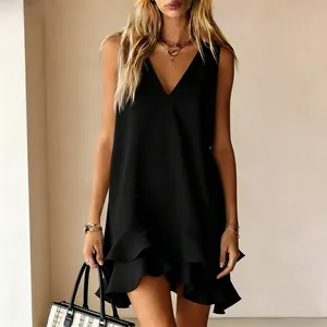Detailed view of women's sleeveless black V-neck dress with layered ruffle hem