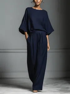 Elegant navy blue bell sleeve linen set showing loose fit and fabric texture