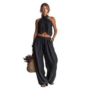 Ensemble de vacances d'été chic avec haut licou croisé et pantalon ample à jambes larges