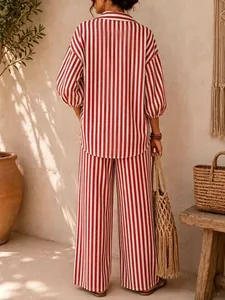 Back view of a red and white striped casual lounge set with oversized shirt and trousers