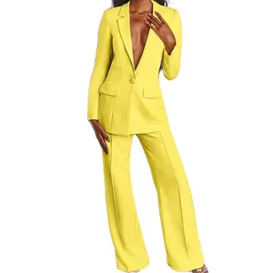 Elegante completo tailleur da donna giallo brillante con blazer e pantaloni larghi