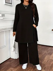 Elegant black 2-piece casual set featuring a long-sleeve tunic and wide-leg trousers.