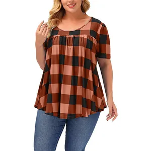 Detail of women's round neck loose plaid blouse with burnt orange buffalo check pattern
