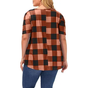 Back view of women's loose round neck short sleeve orange and black buffalo plaid T-shirt