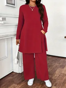 Elegant casual red two-piece set featuring a long-sleeved tunic and wide-leg trousers