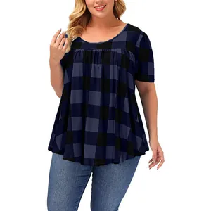 Close-up detail of women's summer short sleeve loose plaid top with pleated crew neck