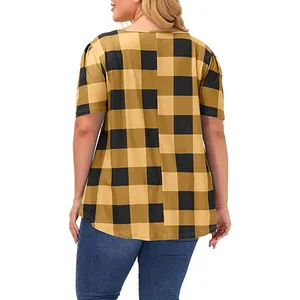 Back view of women's loose round neck T-shirt in yellow and black buffalo plaid pattern.