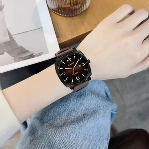 Minimalist unisex quartz wristwatch featuring a brown silicone strap and square dial