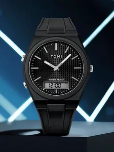 Détail d'une montre de sport TOMI noire avec double affichage analogique-numérique.