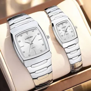 Elegant silver stainless steel quartz couple watches with rhinestone markers on dial.