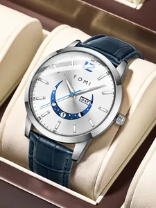 TOMI minimalist silver watch with blue leather strap featuring date and moon phase display