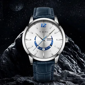 Modern TOMI unisex wristwatch featuring a silver dial, blue leather strap, and calendar