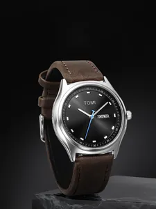 Detailed macro shot of TOMI fashion minimalist dual calendar watch with brown leather strap