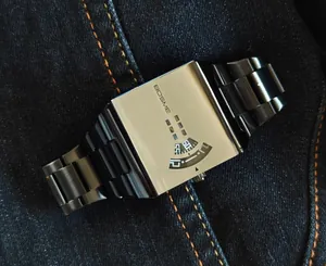 Close-up of a modern square men's quartz watch with a sleek black stainless steel band