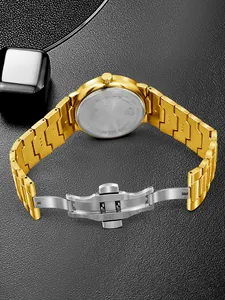 Detailed macro view of the gold-tone men's watch back with stainless steel clasp mechanism.