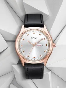 Close-up view of TOMI minimalist watch with rose gold case and black leather strap