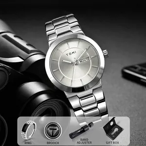 Stylish men's minimalist silver watch gift set with brooch, ring, and band adjuster