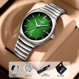 Coffret cadeau TOMI avec montre pour homme argentée, cadran vert et accessoires de mode.