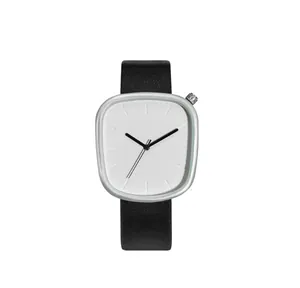 Montre à quartz minimaliste en forme de galet avec cadran blanc et bracelet en cuir noir