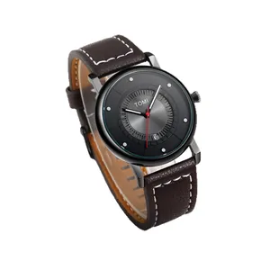Orologio minimalista TOMI con cinturino in pelle marrone e datario per uomo e donna