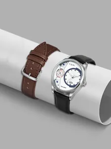 Détail des montres à quartz TOMI pour hommes avec bracelets en cuir texturé marron.