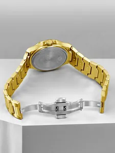 Detailed view of the gold-tone stainless steel back and clasp of the TOMI men's watch