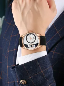 Gros plan de la montre à quartz TOMI pour homme avec boîtier en or rose et bracelet noir