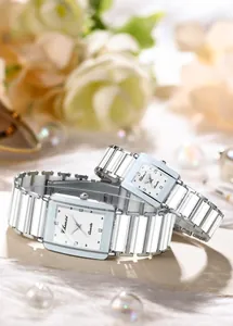 Detailed shot of CHENXI square couple quartz watches with white ceramic straps