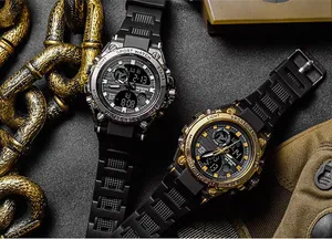 Close-up of two SANDA military sports watches in gold and silver on black background
