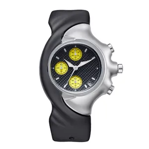 Close-up detail of futuristic Y2K asymmetrical silver quartz watch with yellow dials