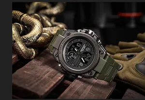 Close-up of green military style sport watch with SANDA logo on a wooden background