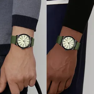 BIDEN sports quartz watch shown on light and dark skin tones with a green nylon strap.
