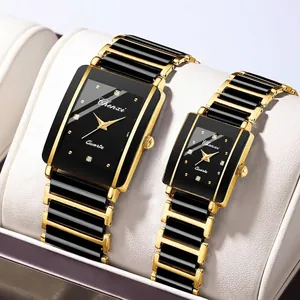 Elegant luxury square couple quartz watches featuring gold-tone metal and black ceramic bands.