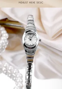 Elegant GEDI women's silver bracelet watch with sparkling rhinestone details and white dial.