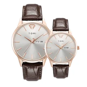 Minimalistische TOMI-Quarzuhren für Paare mit braunem Lederarmband und Datumsanzeige