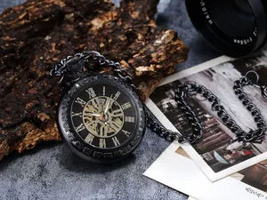 Macro view of vintage mechanical pocket watch with black casing and skeleton dial