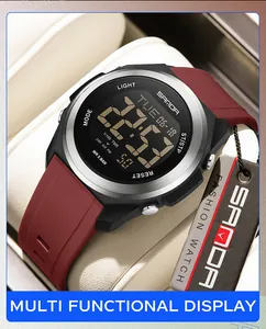 Gros plan de la montre de sport numérique SANDA avec bracelet bordeaux et lunette argentée.