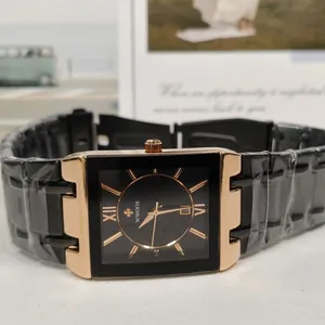 Detailed macro view of WWOOR square men's quartz watch with black dial and gold accents