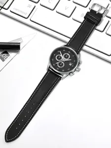 Close-up of TOMI men's quartz watch with black leather strap and chronograph dial