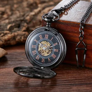 Montre à gousset mécanique squelette noire vintage avec chiffres romains sur coffre en bois