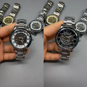 Detailed view of WINNER men's skeleton mechanical watches with silver metal straps