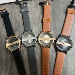Vier varianten van TOMI uniseks horloges met een opengewerkte wijzerplaat en leren band