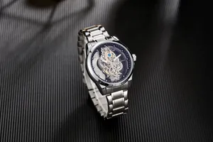 Luxury men's silver stainless steel automatic skeleton watch with visible gears